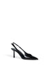 Black patent leather slingback pumps