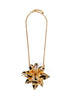 Gold metal necklace with oversized flower