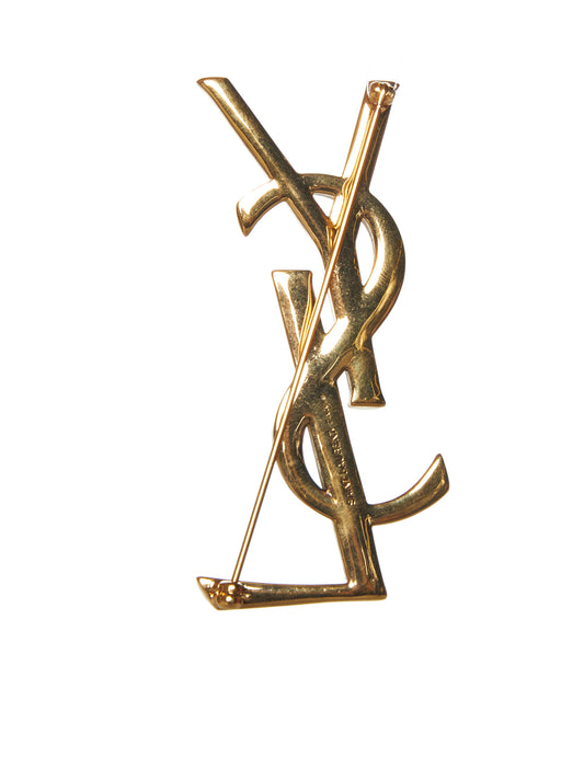“YSL Opyum brooch”