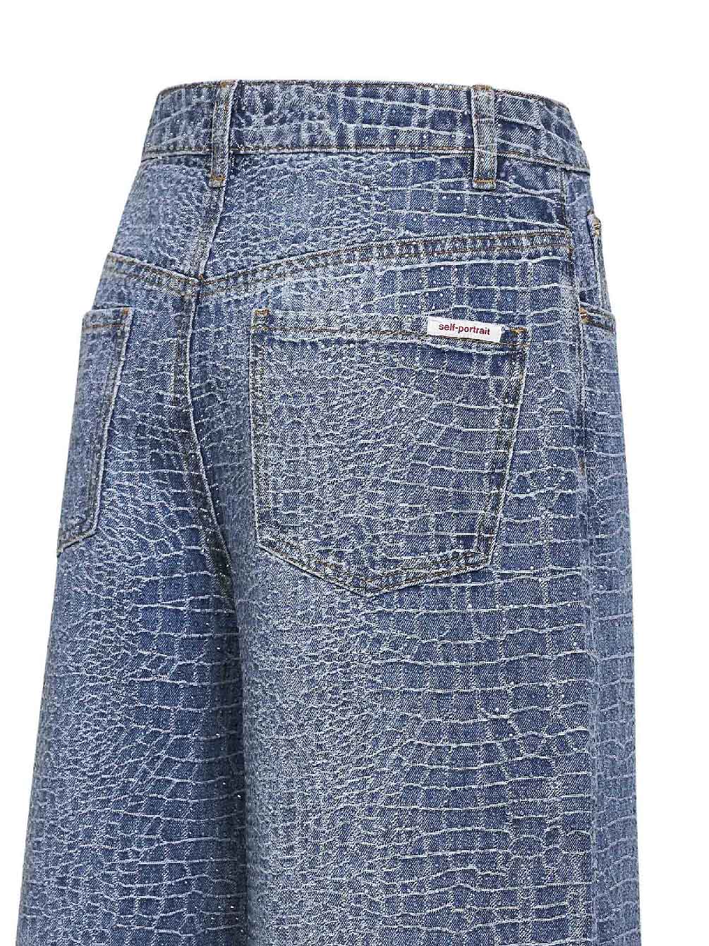 Jeans in denim stretch effetto coccodrillo blu con strass <BR/>