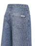 Jeans in denim stretch effetto coccodrillo blu con strass <BR/>