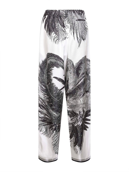 Pantaloni in twill di seta stampa piume